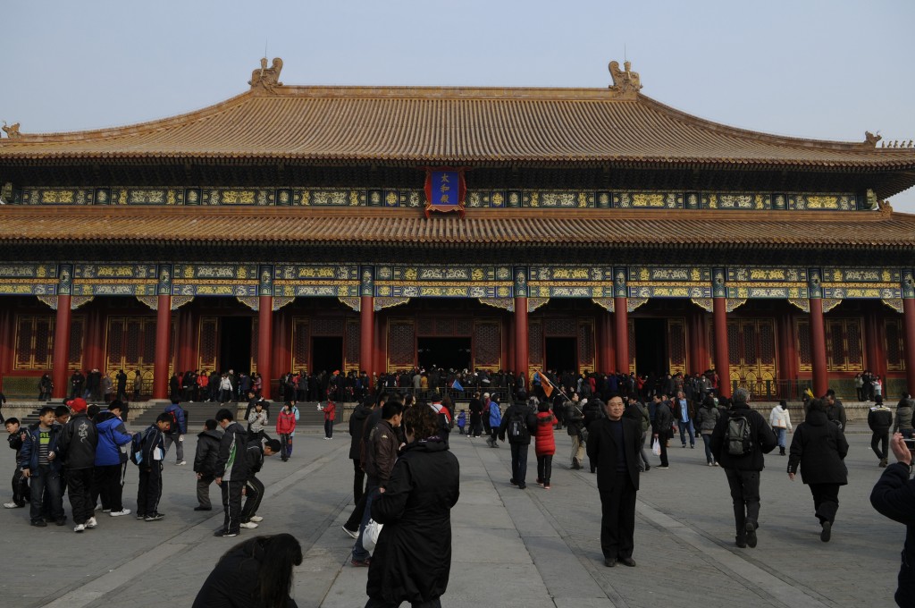 Tourists gather at the Forbidden City in